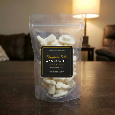 Clear stand-up pouch of cowboy boot and hat wax melts with the Bluegrass Belle label