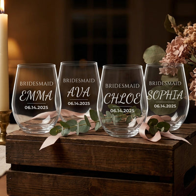 Engraved bridesmaid wine glasses styled as a bridesmaid proposal gift with eucalyptus