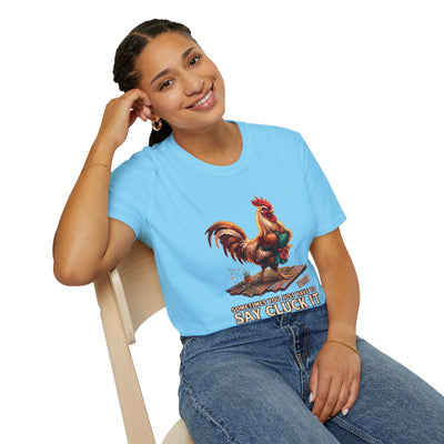 A woman sits smiling, leaning back in a light blue Chicken Shirt - Sometimes You Just Have to Say Cluck It, with jeans