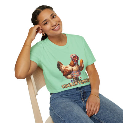 A woman sits on a chair, smiling and wearing a mint green Chicken T Shirt - Chicken Tender with the hen graphic