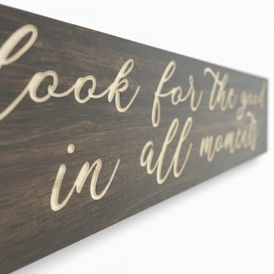 Macro close-up showing the high-quality CNC-carved depth and natural wood grain on a Bluegrass Gifts inspirational sign.