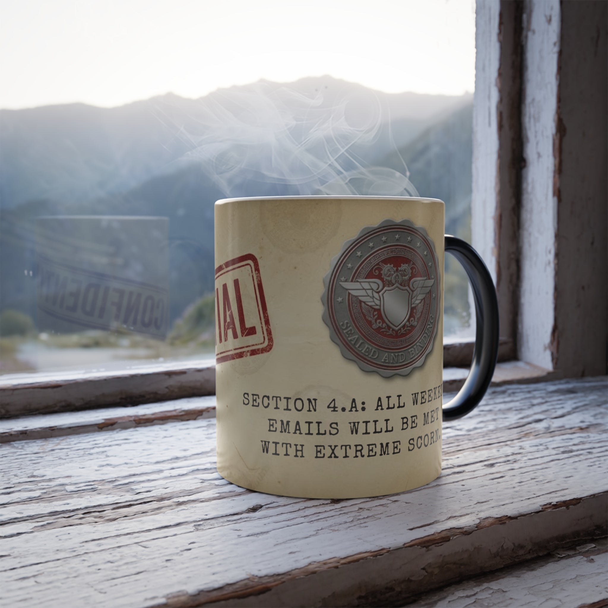 Heat-reveal magic mug with steam, set on a window ledge with a mountain view, revealing the 'CONFIDENTIAL' message.