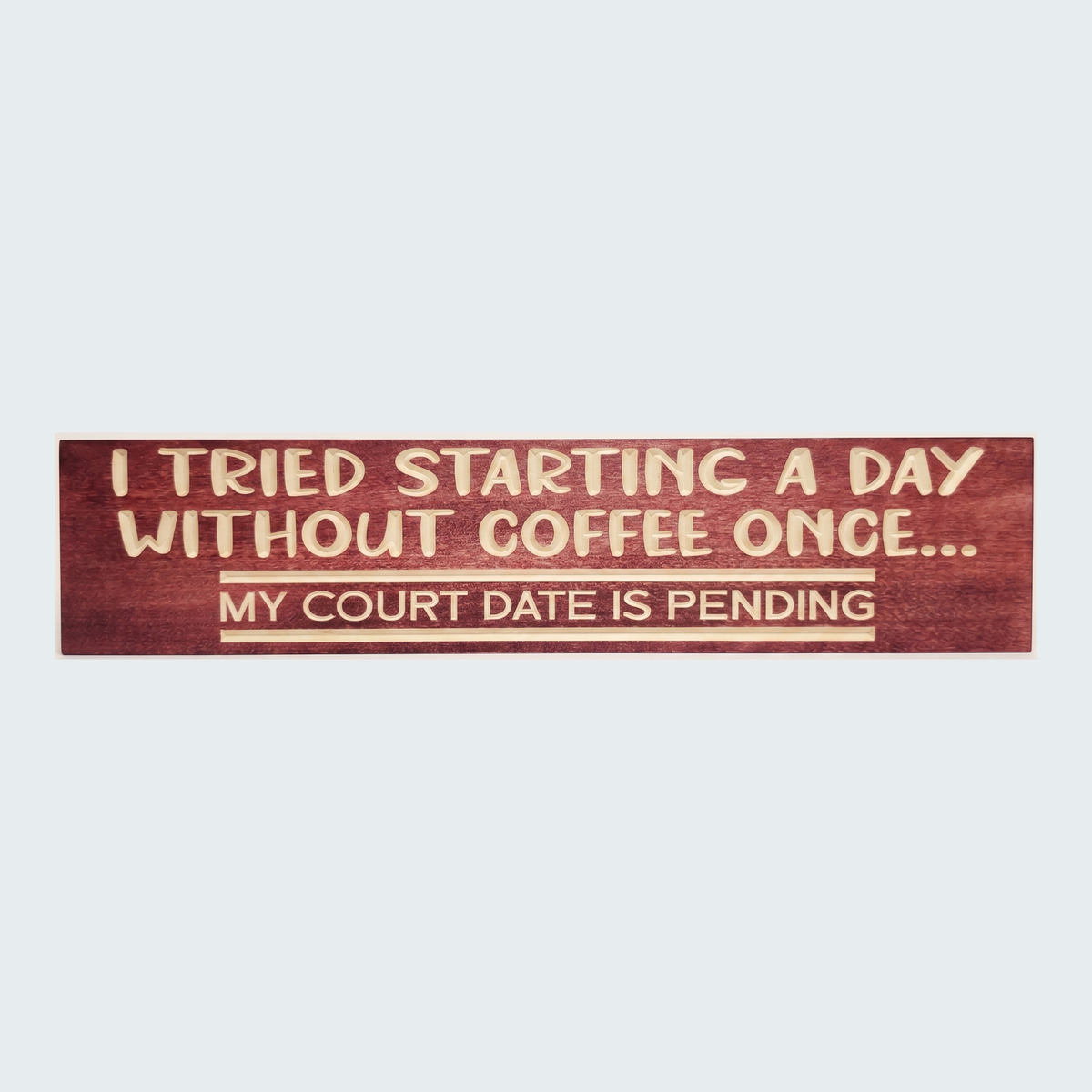 A full frontal view of the carved wood Coffee Sign against a plain, light-colored background