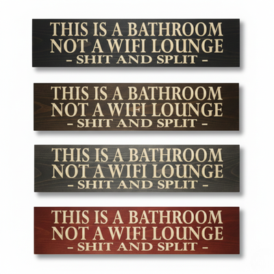 A collection of four Shit and Split bathroom signs displayed in different finish options including Black, Dark Walnut, Weathered Grey, and Barn Red.