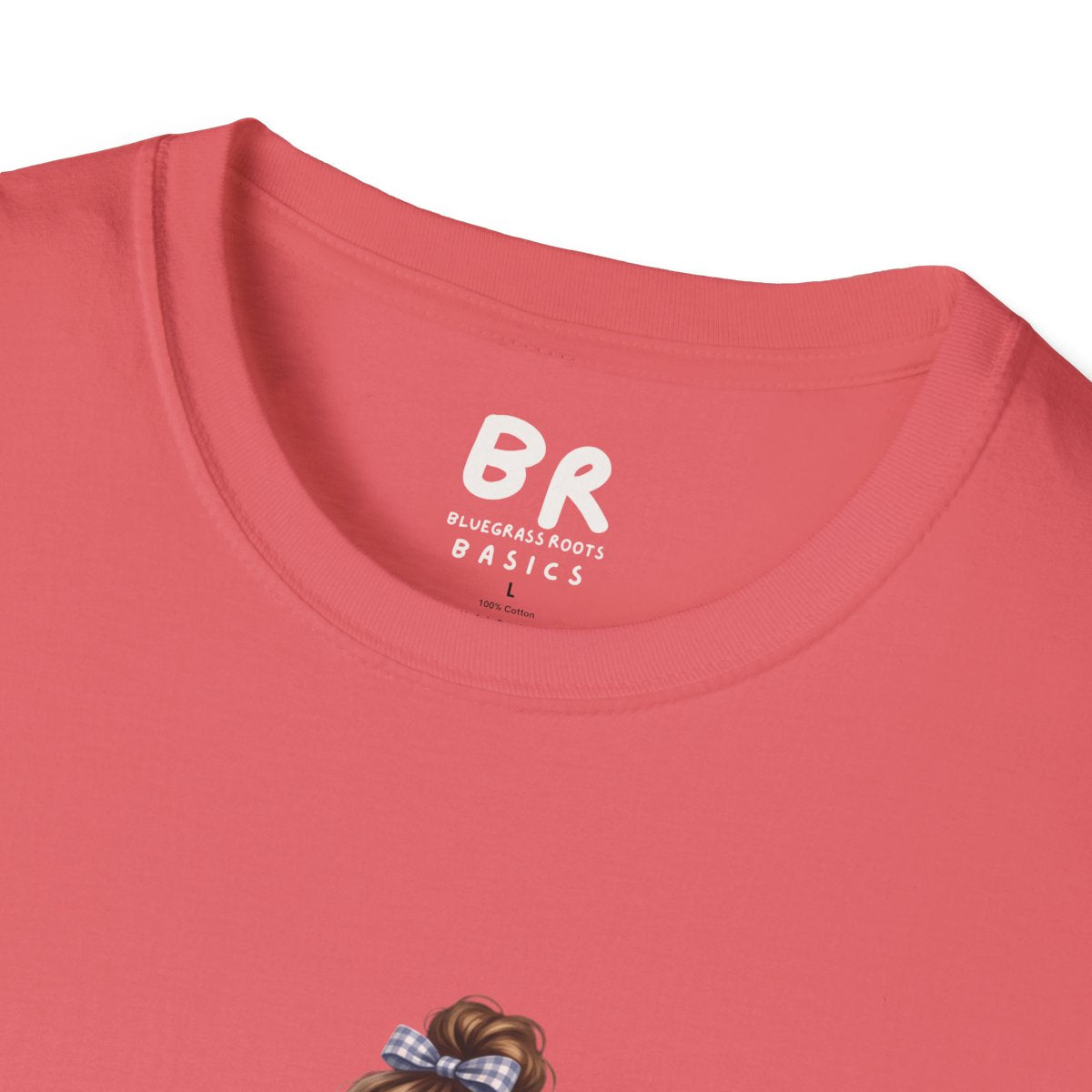 A close-up of the collar of a coral pink Dog Mom Shirt - Fur Mama, showing the Bluegrass Roots Basics brand label
