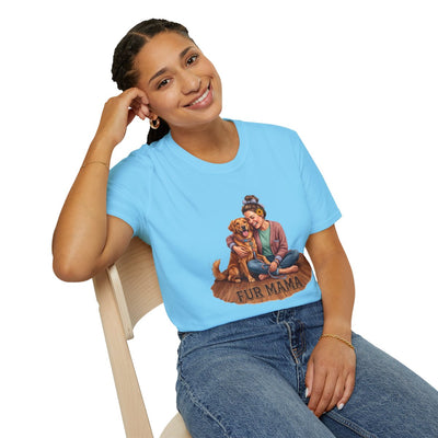 A woman sitting casually in a light blue Dog Mom Shirt - Fur Mama, smiling with her hand resting on her head