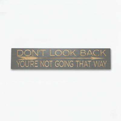 Main product shot of the "Don't Look Back You're Not Going That Way" carved wood sign by Bluegrass Gifts on a clean white background.