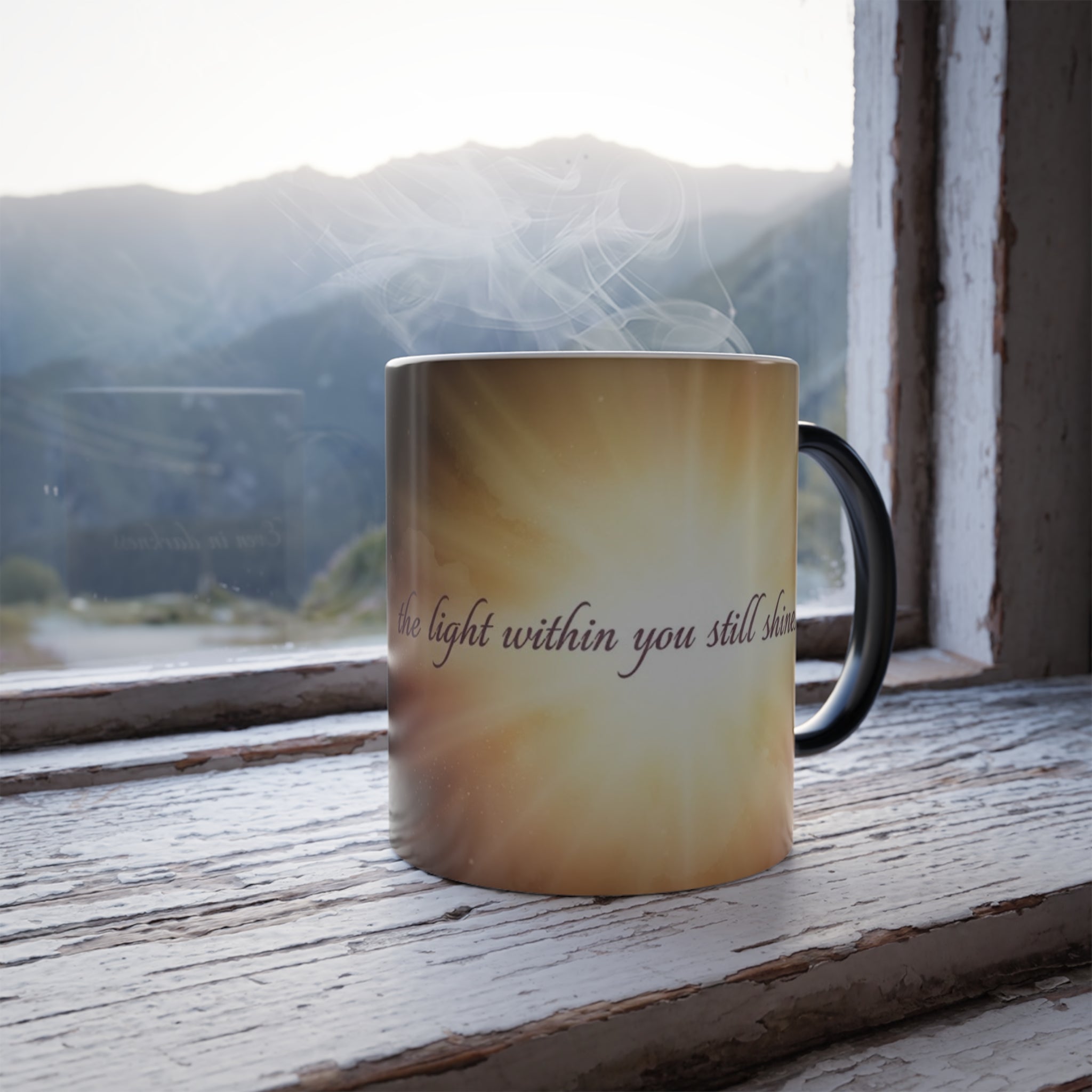 Bright glow of the mug’s design sitting in a windowsill with sunrise