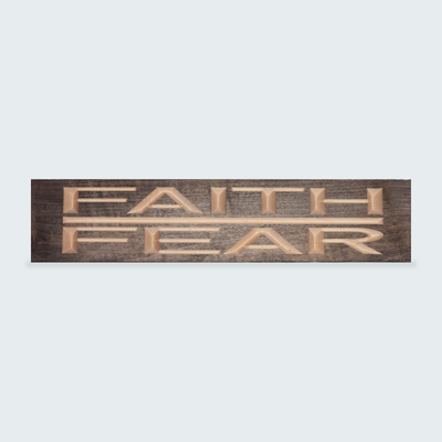 The Faith Over Fear Sign is centered horizontally against a plain light background, showing its full length and dark stain