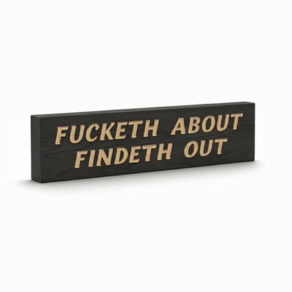 An angled view of the "Fucketh About Findeth Out" sign, showing the deep CNC V-carving and the rich wood grain.