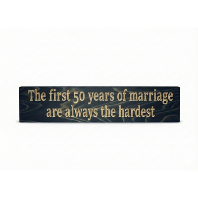 "Handmade solid wood 50th anniversary sign with funny marriage quote 'The first 50 years are always the hardest' in black finish."