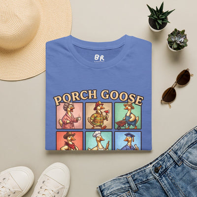 A flat lay shows the folded blue Goose Shirt - Porch Goose Mom with six cartoon geese, next to a hat, sunglasses, and jeans