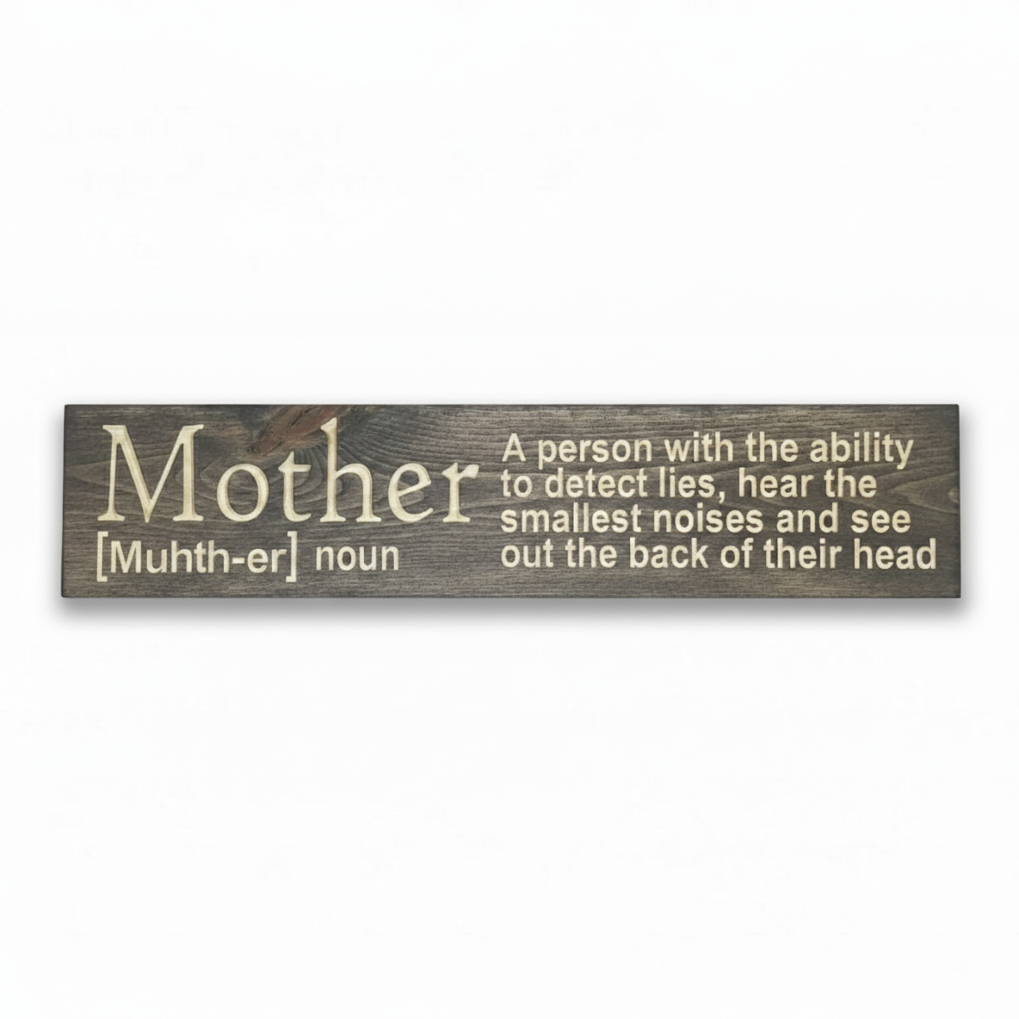 sdfFront-facing view of a "Mother" dictionary definition wood sign in a dark walnut finish, featuring the humorous quote: "A person with the ability to detect lies, hear the smallest noises, and see out the back of their head