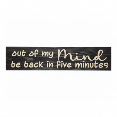 Handcrafted dark wood sign with witty text "out of my Mind be back in five minutes" featuring deep 3D CNC carving.