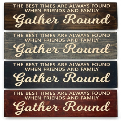 Comparison of the "Gather Round" carved wood sign in four different finishes: Dark Walnut, Weathered Gray, Ebony, and Barn Red.