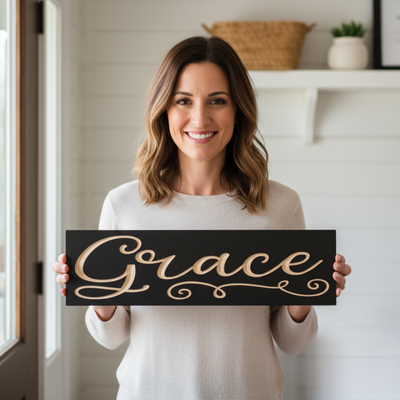 Woman holding handcrafted Grace wooden sign made in Kentucky by Bluegrass Gifts