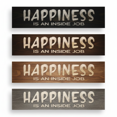 Three versions of the Happiness Is An Inside Job carved sign showing different premium wood stains: dark walnut, weathered gray, and carbon gray.
