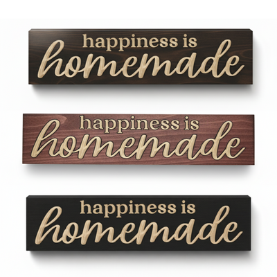Happiness is Homemade carved wood sign shown in dark walnut, cherry and black finishes for farmhouse kitchen decor.