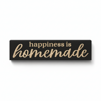 Straight-on view of the Happiness is Homemade carved wood sign for rustic farmhouse wall decor.