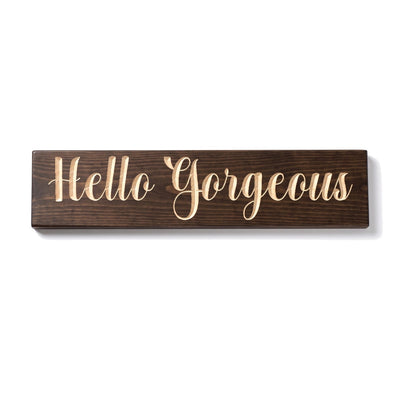 Hello Gorgeous sign carved into solid wood in a Dark Walnut stain, straight on, on a white background