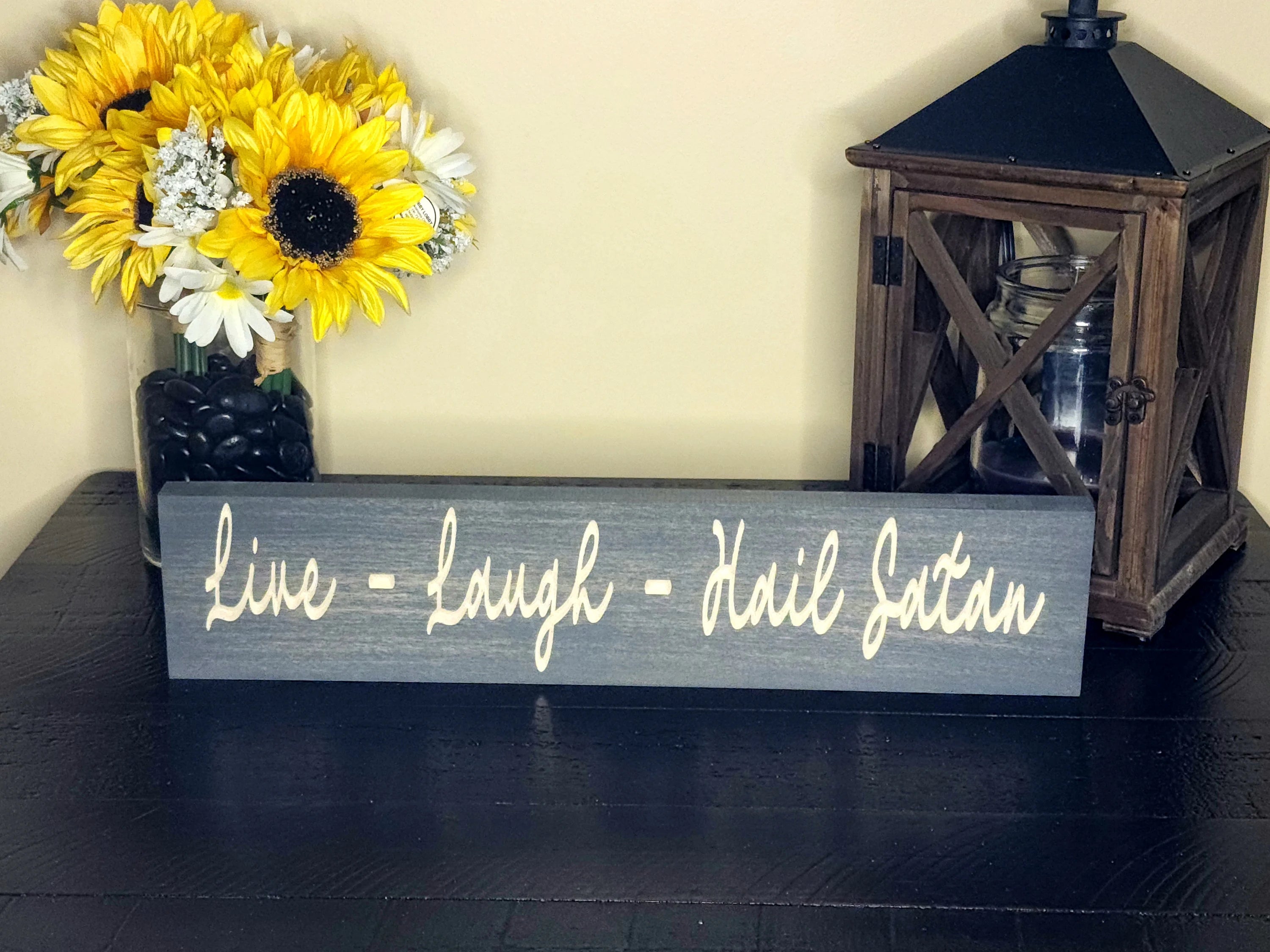 Gothic wall art featuring "Live Laugh Hail Satan" with macabre and edgy style