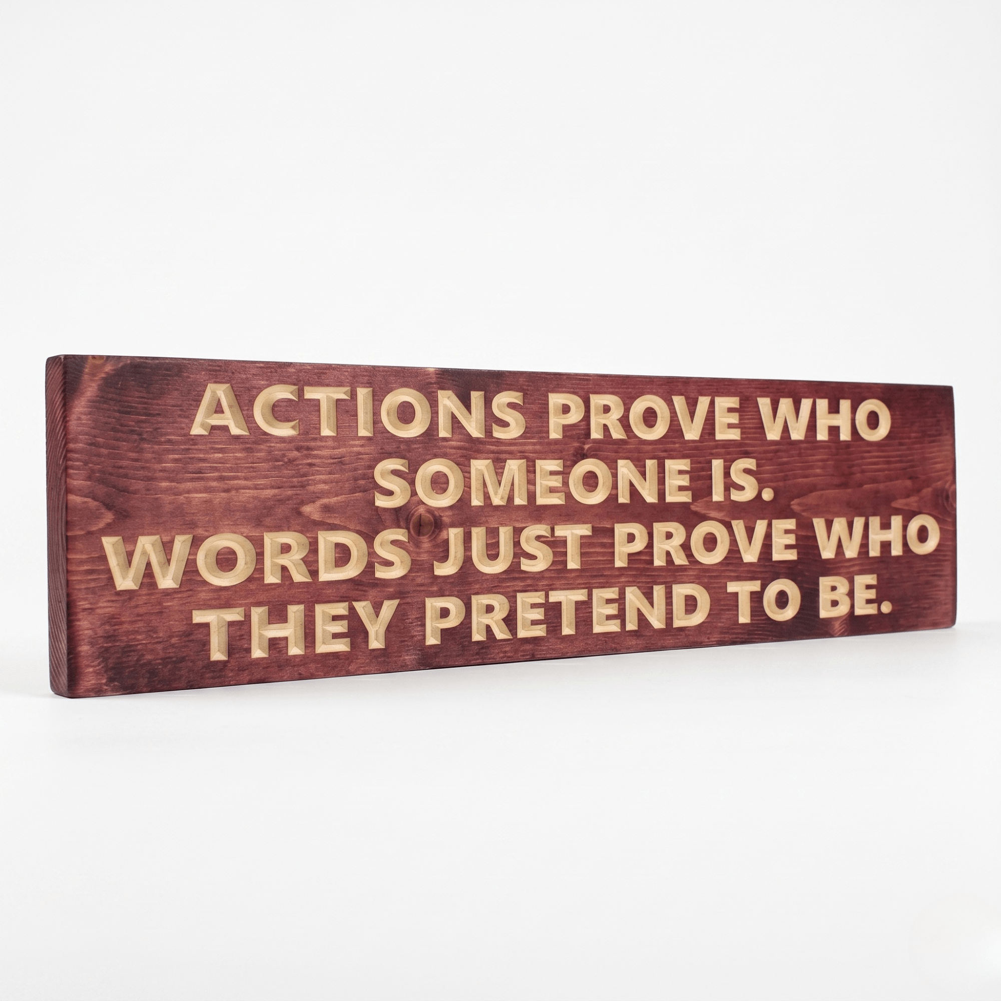 Side angle view of the inspirational integrity wood sign showing dimensional CNC carved letters and solid wood thickness in deep cabernet stain finish.