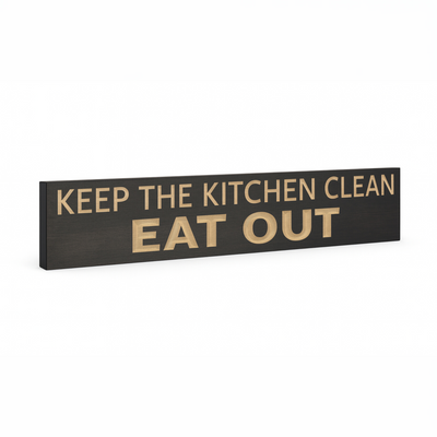 Keep the Kitchen Clean Eat Out wooden kitchen sign angled view showing carved lettering