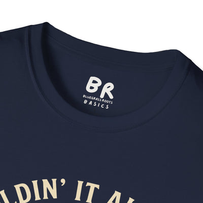 A close-up of the collar tag on a navy "Kentucky Shirt - Holdin' It All Together" tee, showing the BR Bluegrass Roots logo