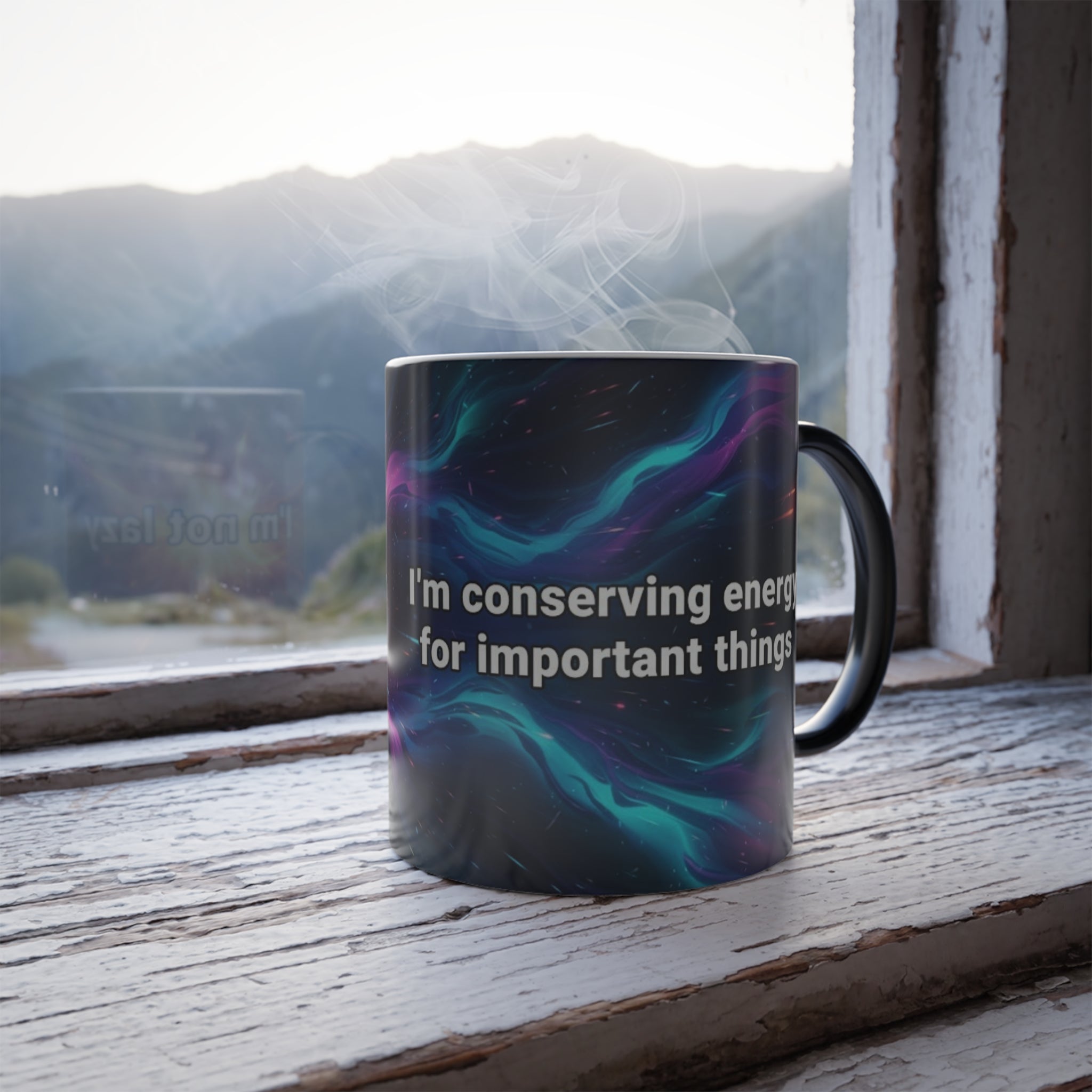 I’m Not Lazy heat-reveal mug on rustic window sill with rising steam and glowing nebula design.