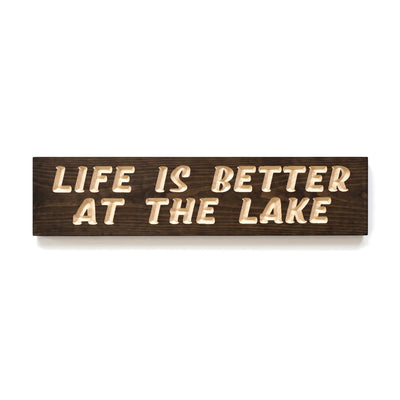 Life Is Better at the Lake sign carved into solid wood in a Dark Walnut stain, straight on, on a white background