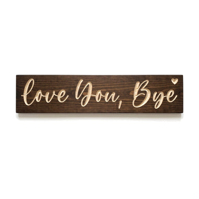 Love You, Bye sign carved into solid wood in a Dark Walnut stain, straight on, on a white background
