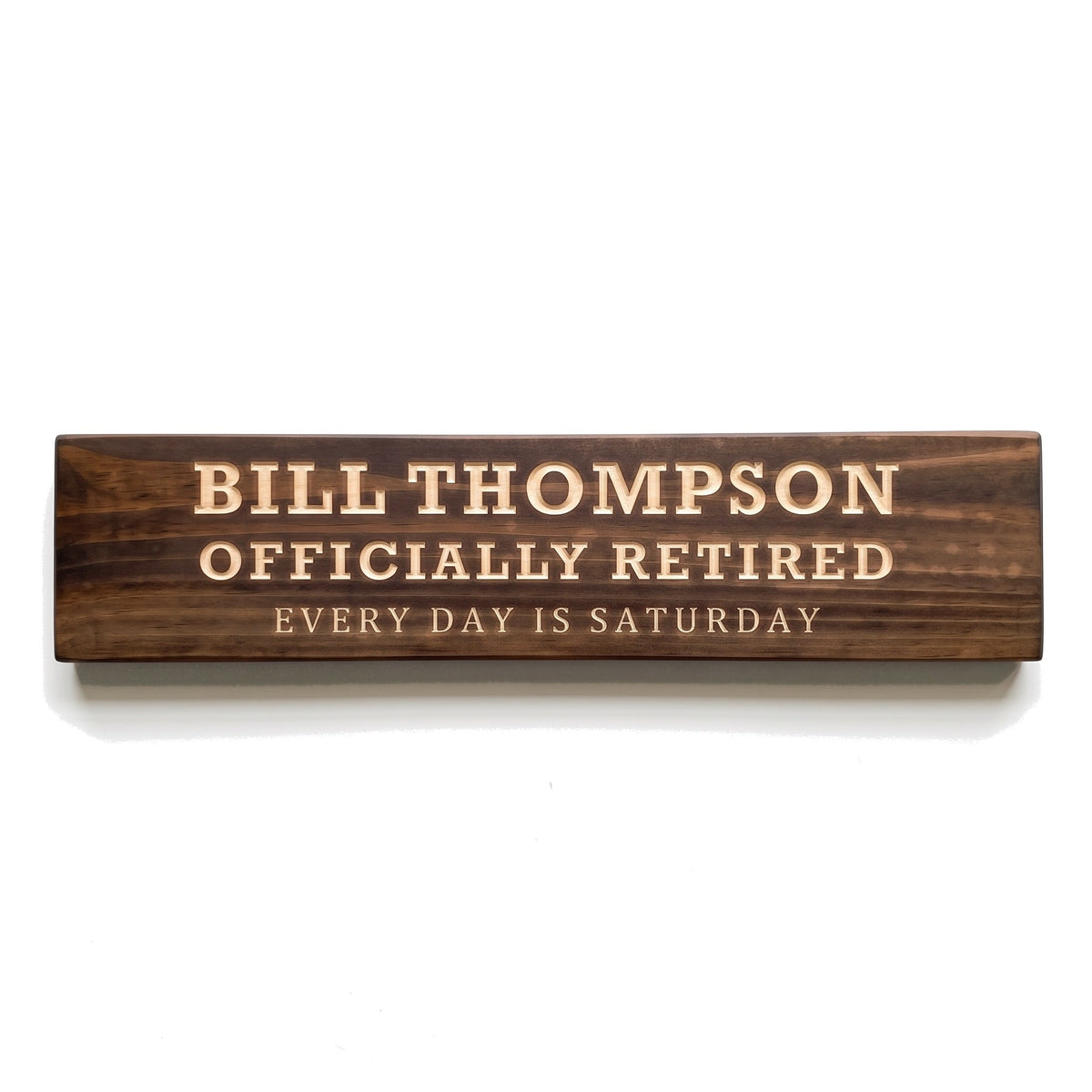 Personalized Bill Thompson sign carved into solid wood in a Dark Walnut finish, straight on, on a white background (studio photo)
