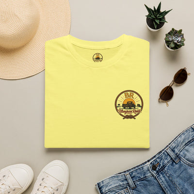 Raised Right Shirt — "Raised Right, Ran Wild, Came Home" Tee in Cornsilk