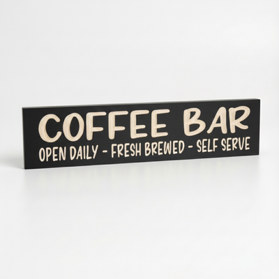 Angled view of the black finished Coffee Bar sign showing the solid wood thickness and heirloom quality.