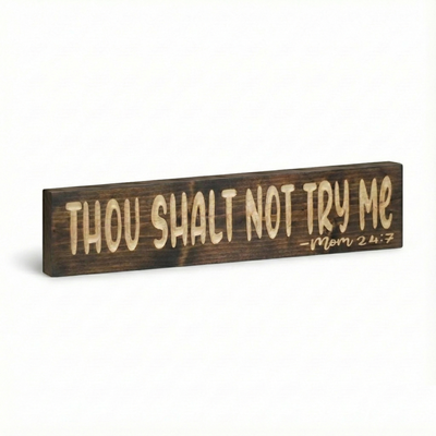 Isolated view of the rustic farmhouse style wooden sign saying "Thou Shalt Not Try Me - Mom 24:7" against a white background.
