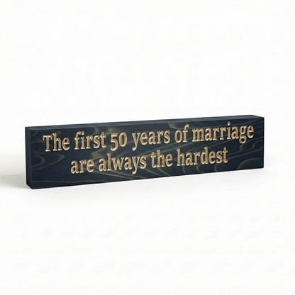 "Side view of a 0.75 inch thick solid wood anniversary plaque showing the depth of the CNC carving and natural grain."