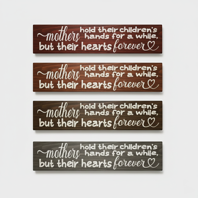 Four carved wood signs shown in different premium finishes including Dark Walnut, Early American, Weathered Grey, and Midnight Ebony.