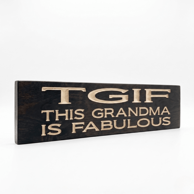 Angled view of the TGIF This Grandma Is Fabulous solid wood sign showing dimensional CNC-carved letters and ebony stain on real Pine