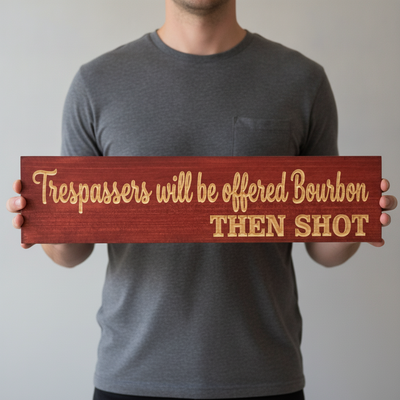 Funny No Trespassing Sign — Trespassers Offered Bourbon — shown to scale, held — Bluegrass Gifts