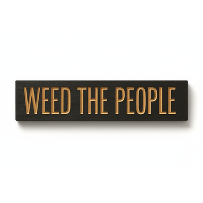  A clean, flat lay image of a "Weed The People" hand-carved wood sign with a black finish and natural wood letters, showcasing quality craftsmanship.