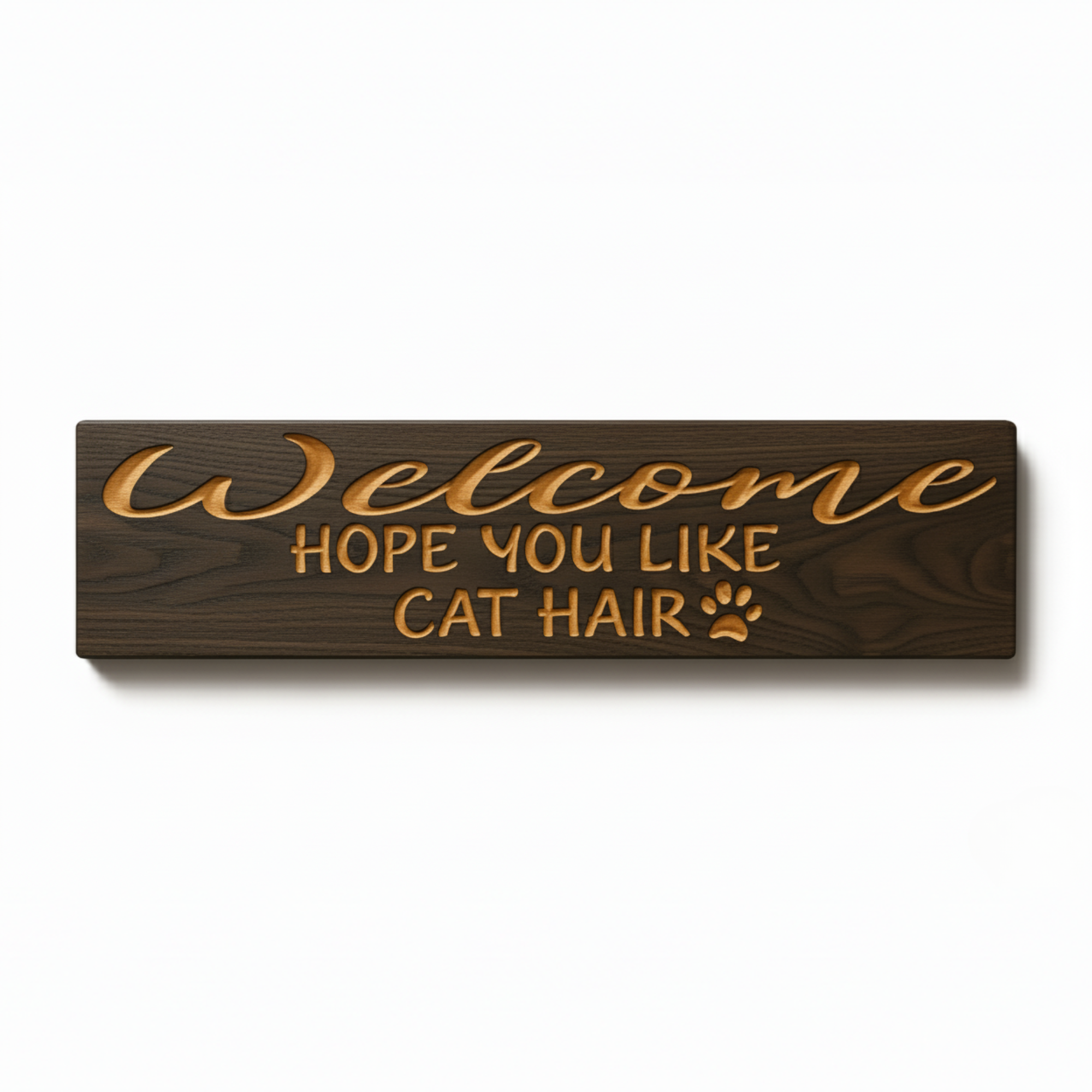 A straight-on product shot of the "Welcome hope you like cat hair" sign, showing the deep CNC-carved letters in the dark-stained solid wood.
