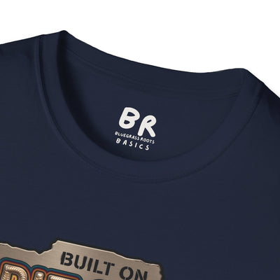 A close-up of the collar tag on a navy blue Welding Shirt - Built on Grit & 6011, with the BR Bluegrass Basics logo
