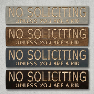 Comparison of four finish options for the No Soliciting sign: Weathered Grey, Classic Walnut, Charcoal Slate, and Espresso.