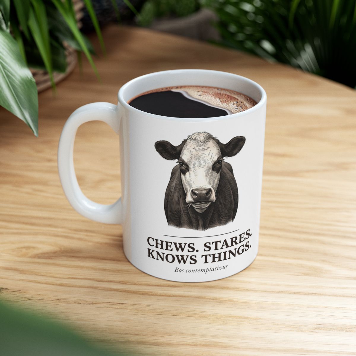 Cow Coffee Mug — "Chews. Stares. Knows Things." Vintage Engraved Black Baldy Mug
