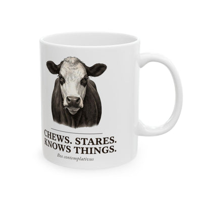Cow Coffee Mug — "Chews. Stares. Knows Things." Vintage Engraved Black Baldy Mug