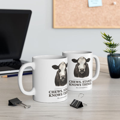 Cow Coffee Mug — "Chews. Stares. Knows Things." Vintage Engraved Black Baldy Mug