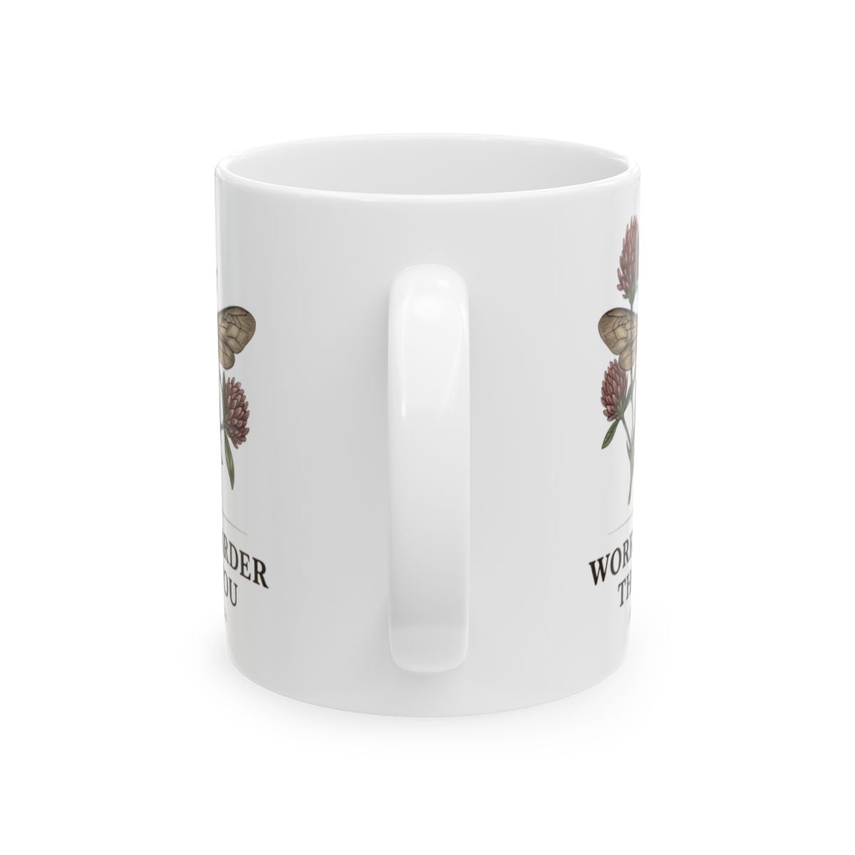 The side view of the white Bee Coffee Mug, showing its handle and partial text, against a clean white background