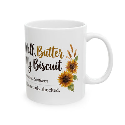 A white ceramic mug with "Well, Butter My Biscuit" text and sunflowers, angled slightly to the right on a white background, highlighting the handle for Mugs for Women