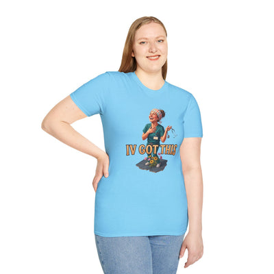 A woman standing with her hand on her hip, wearing a light blue Nurse Shirt - IV Got This, facing forward