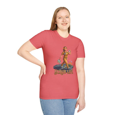 A woman with long blonde hair poses confidently, wearing a coral Nurse Shirt - Scrub Life tee and light blue jeans